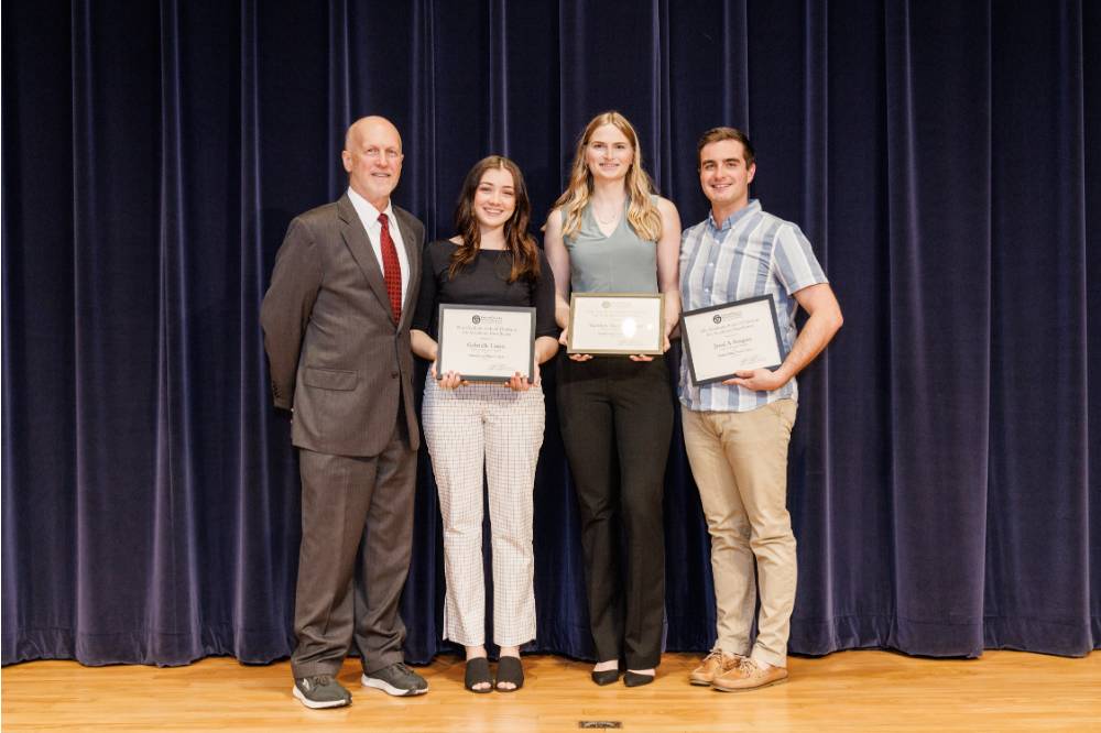 From left to right: Dr. Jeffrey Potteiger, Gabrielle Ureste, Katelyn Erickson, and Jared Gregory